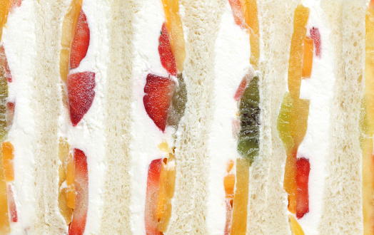 A white bread with fresh whipping cream with Fresh fruit