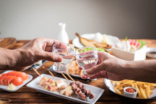 toasting with japanese sake and izakaya popular plates